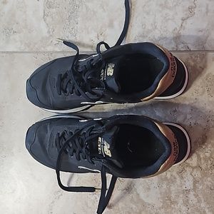 New Balance 515 black and gold